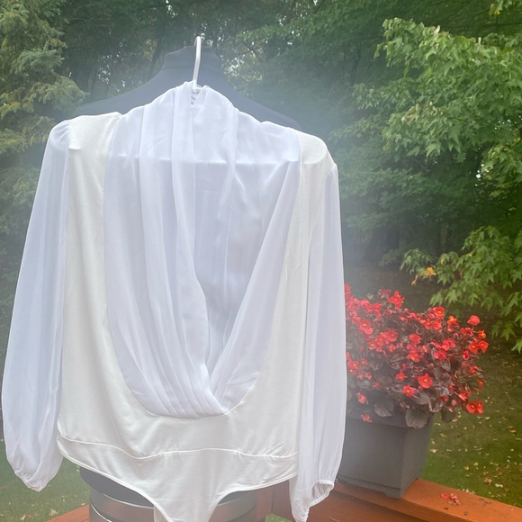 eva mendes for New York & Company Tops - NWT Eva Mendes white bodysuit, sheer sleeves, see measurements in photos.